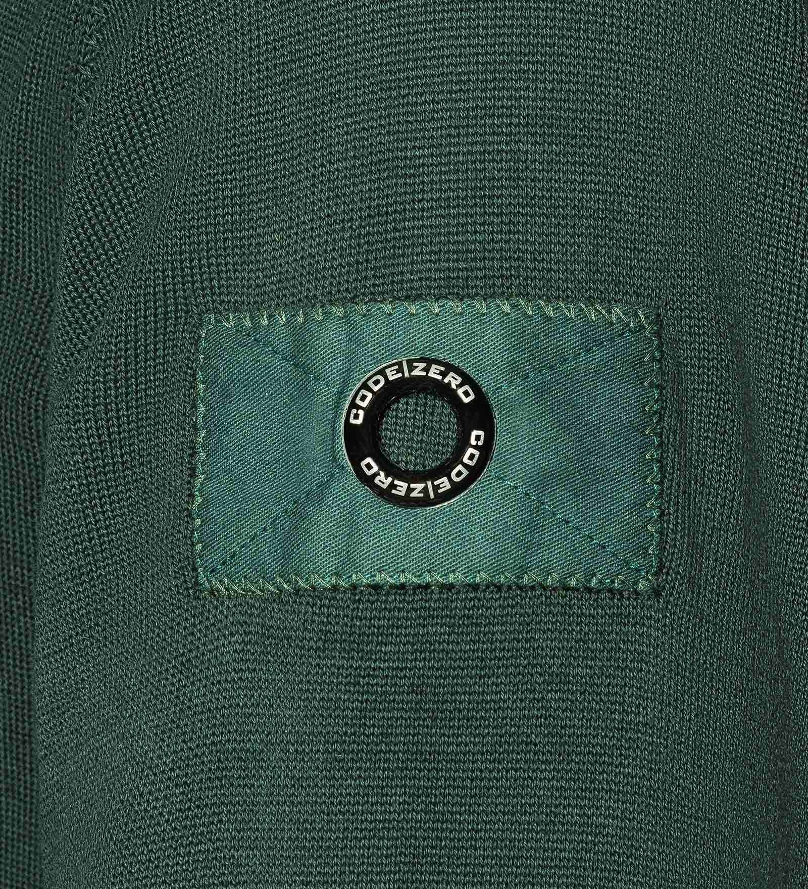 Details of a green jumper